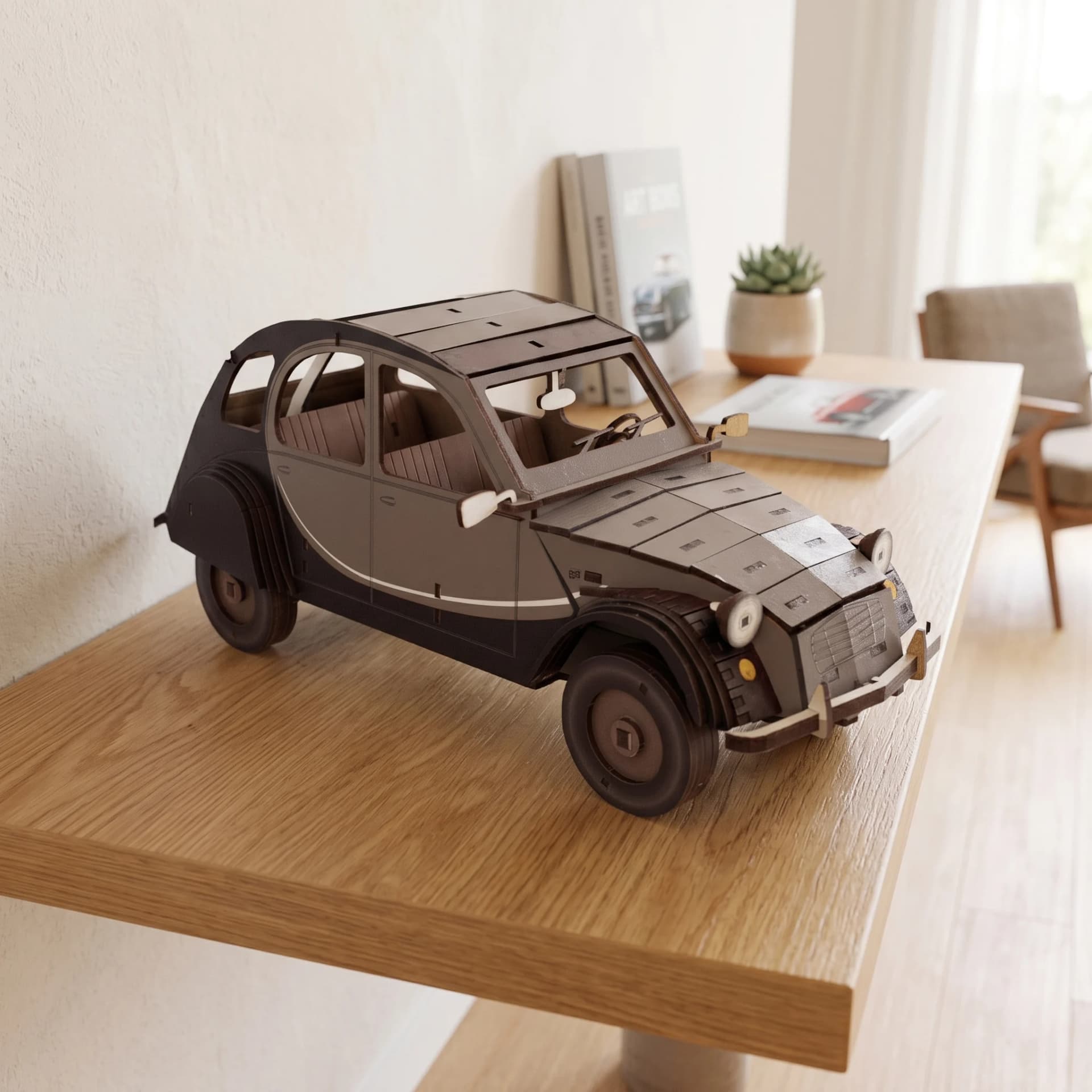 Décoration en bois voiture 2CV Gris posée sur une étagère en bois d'un appartement